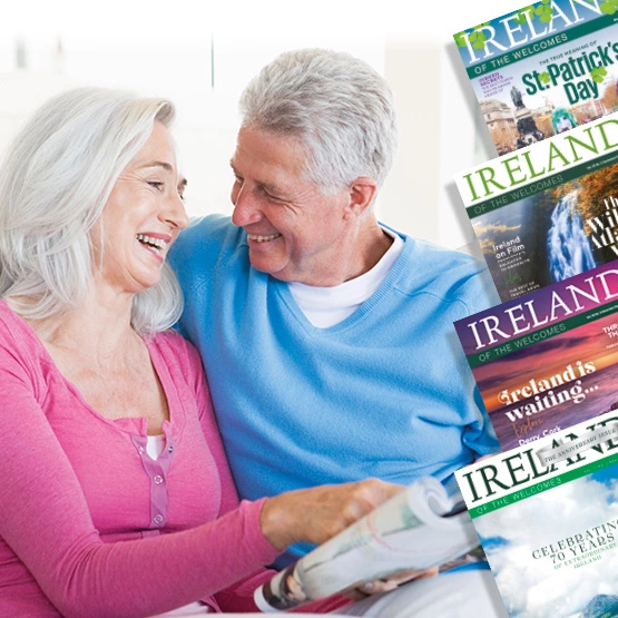 A couple enjoying their subscription to Ireland of the Welcomes magazine